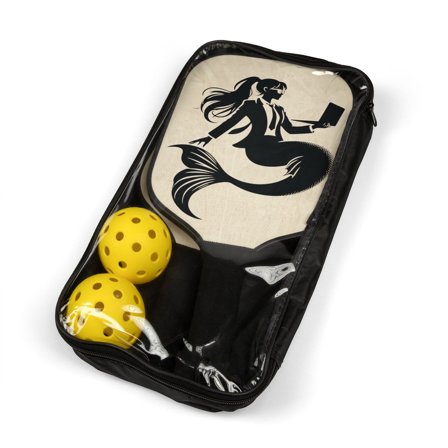 Pickleball set with balls in a plastic bag. Corporate Mermaid black and white design of a mermaid wearing a suit and glasses, hair in a ponytail and holding an open laptop. 