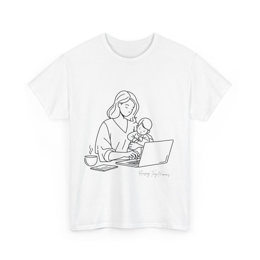 White t-shirt with a mom balancing baby and work with the phrase, Raising Tiny Humans