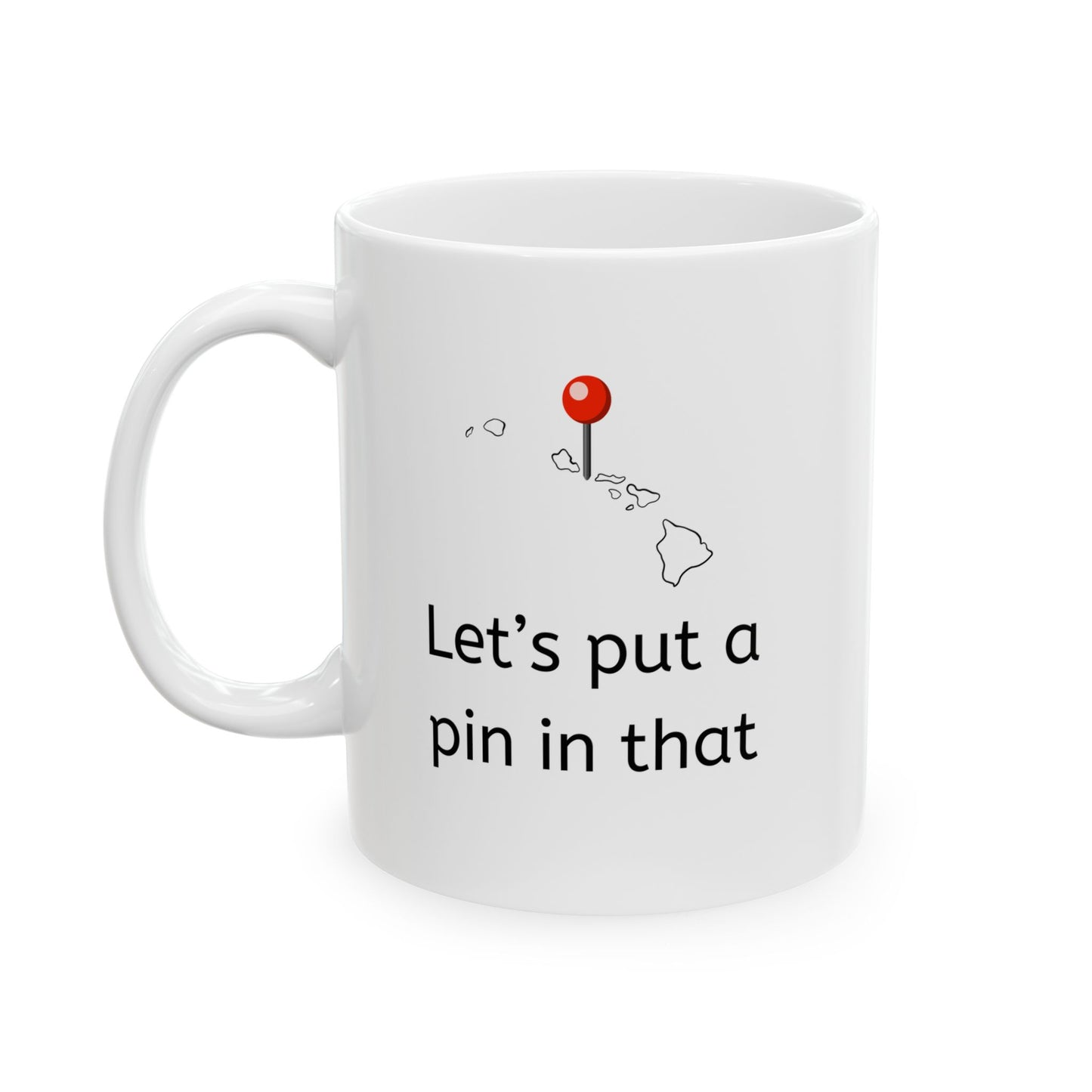 White ceramic mug with map of islands and a location pin and "Let's put a pin in that" corporate jargon phrase - front of mug