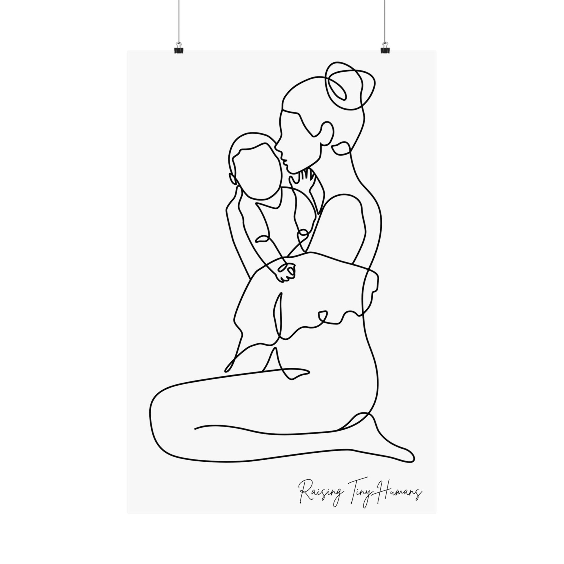 White poster with line drawing of mom holding a baby and the words "raising tiny humans" in handwriting place at the bottom right corner