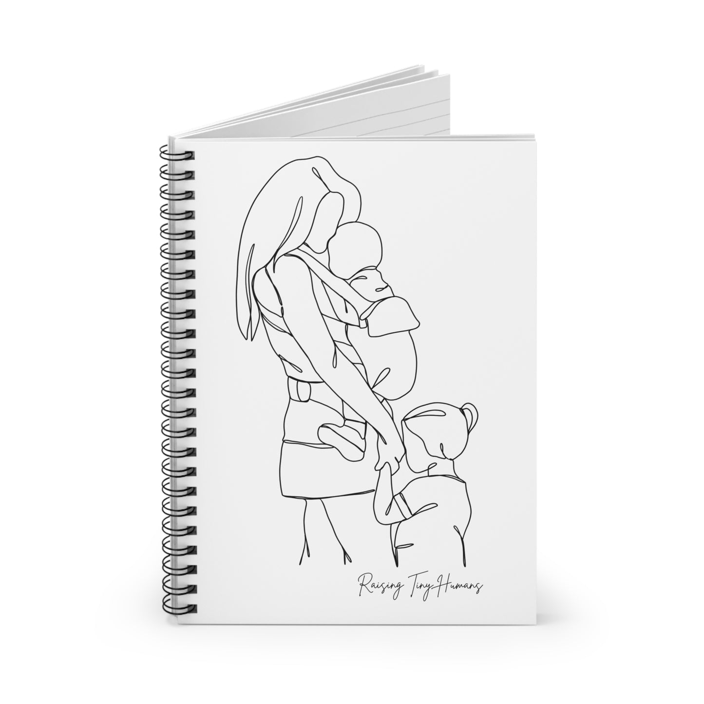 Standing spiral bound notebook, open with a cover featuring a simple line drawing of a mother holding a baby in a wearing carrier and holding the hand of a toddler, with the caption "Raising Tiny Humans" featured in handwriting in the bottom right corner of the cover