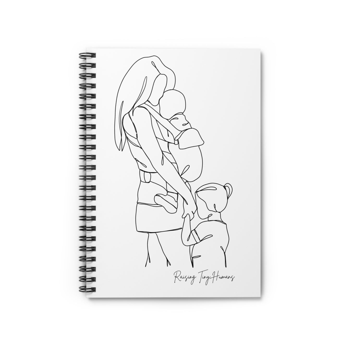 Flat view of a closed spiral bound notebook, with a cover featuring a simple line drawing of a mother holding a baby in a wearing carrier and holding the hand of a toddler, with the caption "Raising Tiny Humans" featured in handwriting in the bottom right corner of the cover